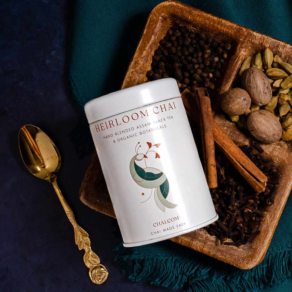 gift card for masala chai, chai package above chai ingredients, gold spoon